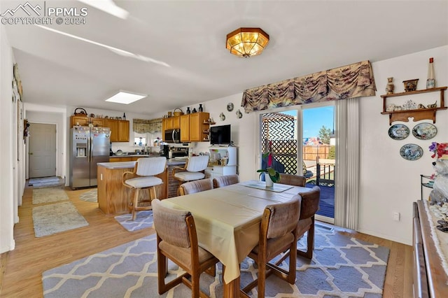 dining room featuring light wood-type flooring