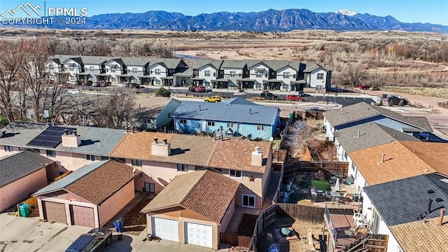 drone / aerial view featuring a mountain view