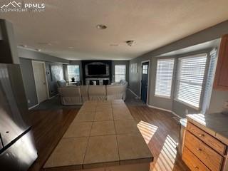 unfurnished living room with a healthy amount of sunlight