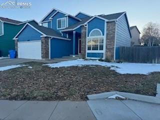 view of front property with a garage