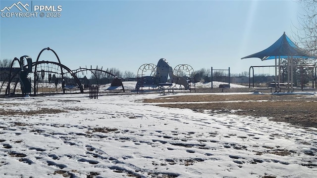 view of property's community with a playground