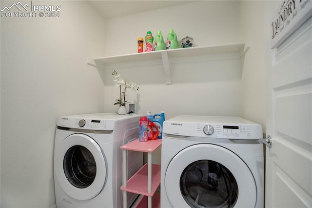 washroom featuring independent washer and dryer