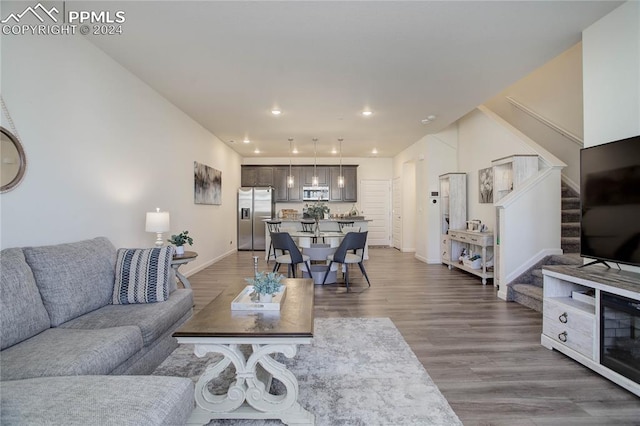 living room with hardwood / wood-style flooring