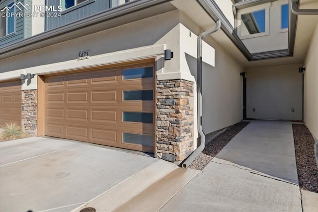 exterior space with a garage