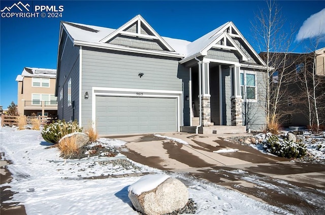 craftsman-style house featuring a garage