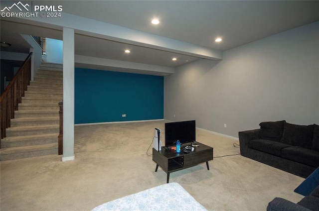 living room with carpet flooring and beam ceiling