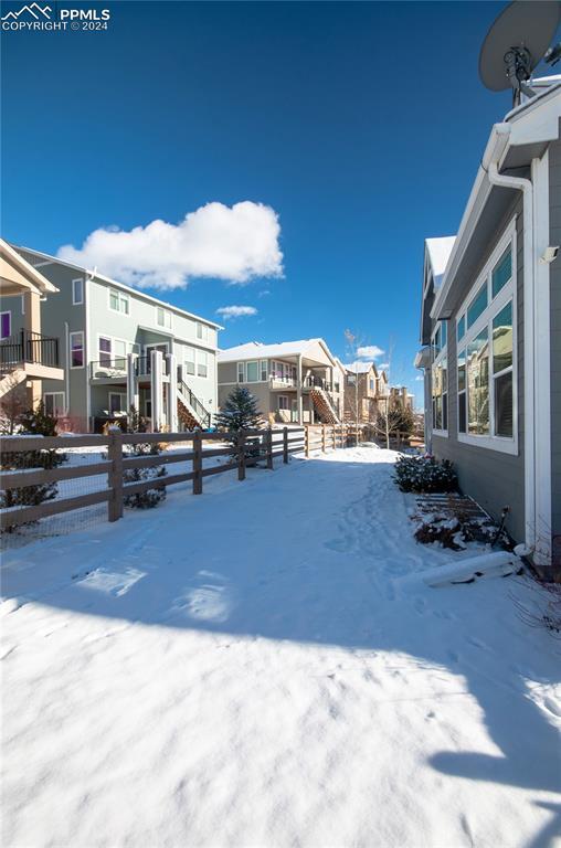 view of yard covered in snow