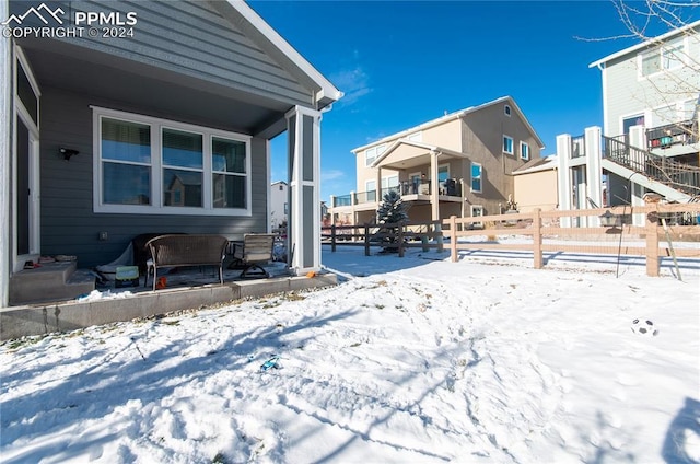 view of yard covered in snow