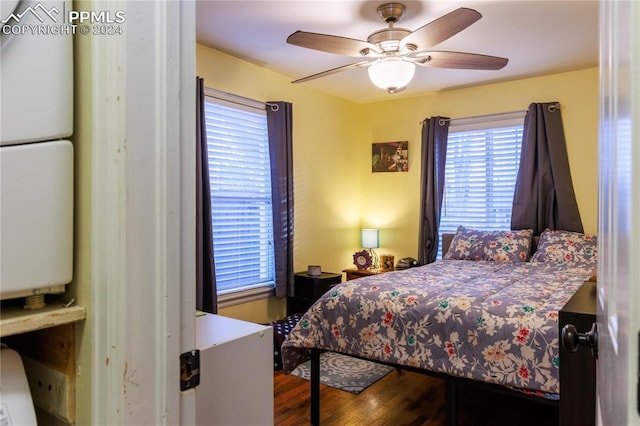 bedroom featuring hardwood / wood-style floors and ceiling fan