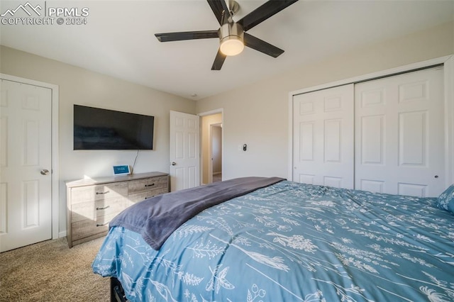 bedroom with carpet flooring, a closet, and ceiling fan