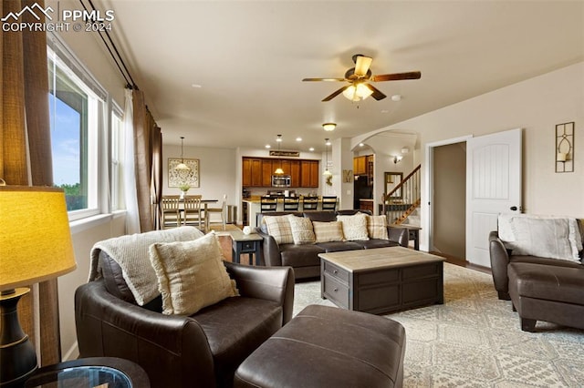 living room featuring ceiling fan