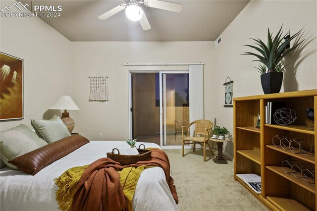 bedroom with light carpet and ceiling fan