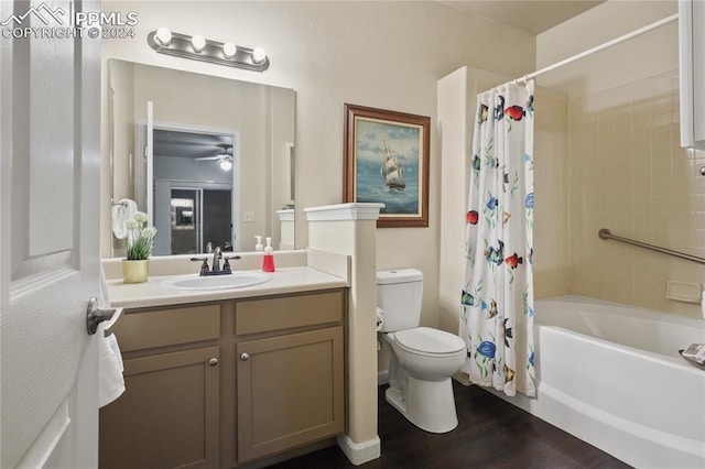 full bathroom with vanity, hardwood / wood-style flooring, toilet, and shower / bathtub combination with curtain