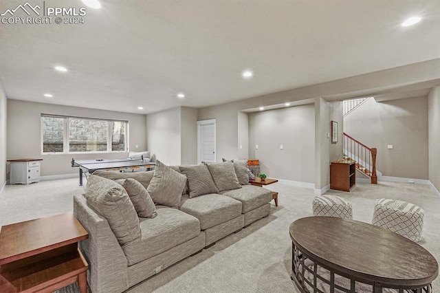 living room featuring light colored carpet