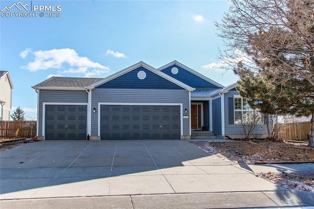 view of front of property with a garage