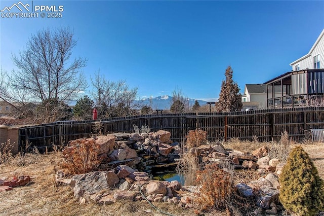 view of yard with a mountain view