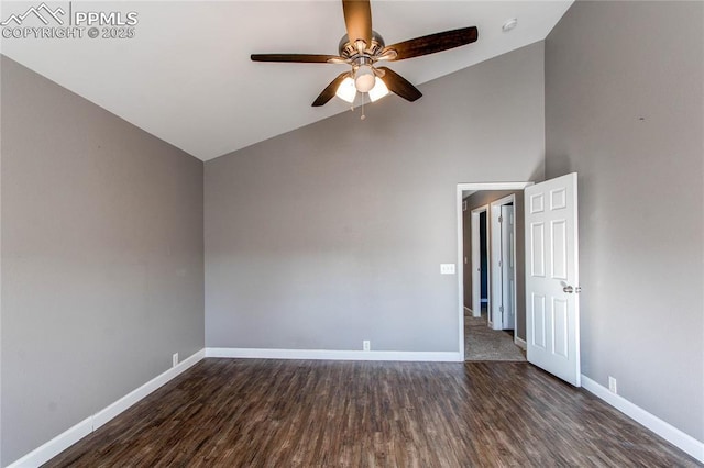 empty room with dark hardwood / wood-style floors, ceiling fan, and high vaulted ceiling