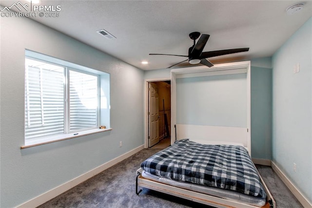 carpeted bedroom featuring ceiling fan