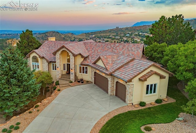 view of front of home with a garage