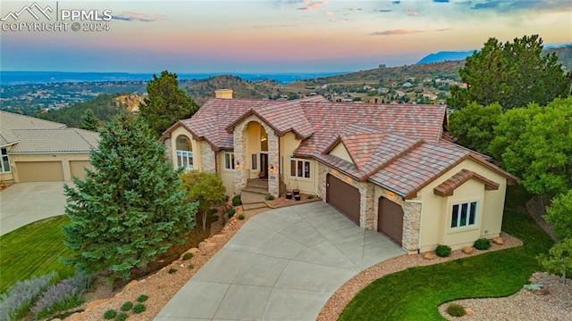 view of front of property with a garage