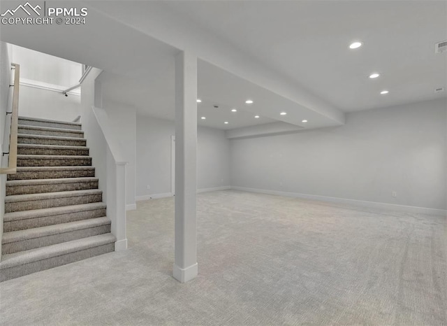 basement with light carpet