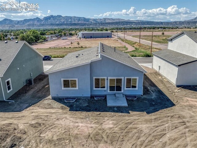 exterior space featuring a mountain view