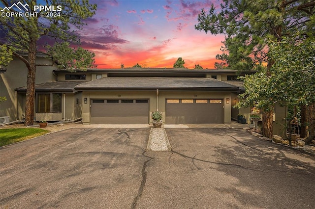 prairie-style home with a garage