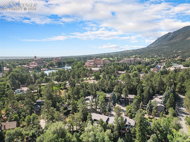 bird's eye view featuring a water and mountain view