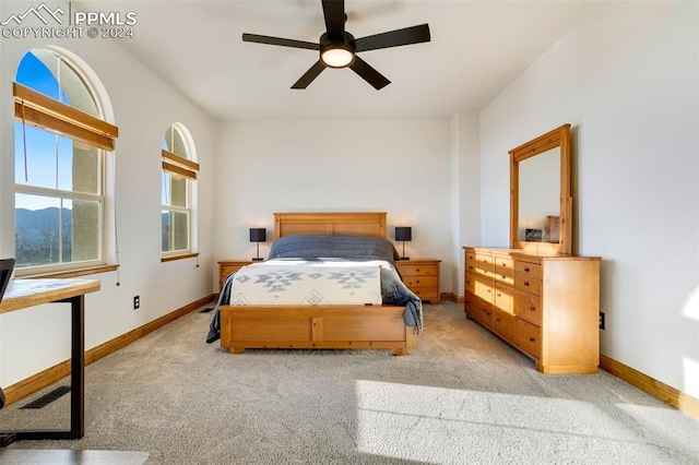 carpeted bedroom featuring ceiling fan