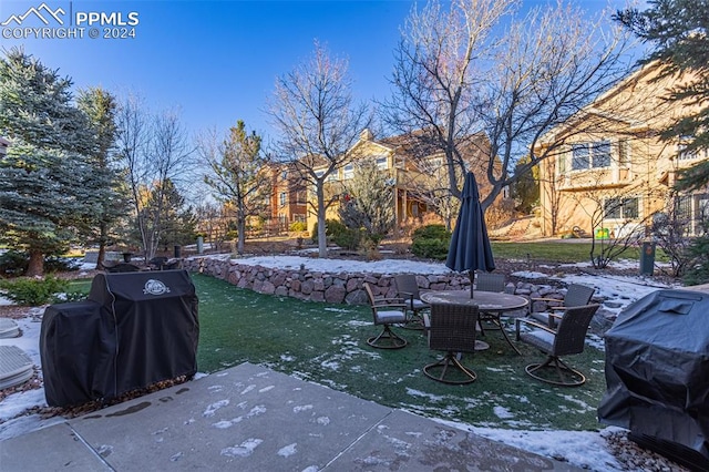 view of patio featuring a grill