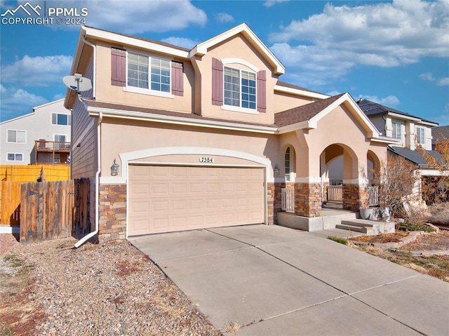 view of front of home with a garage