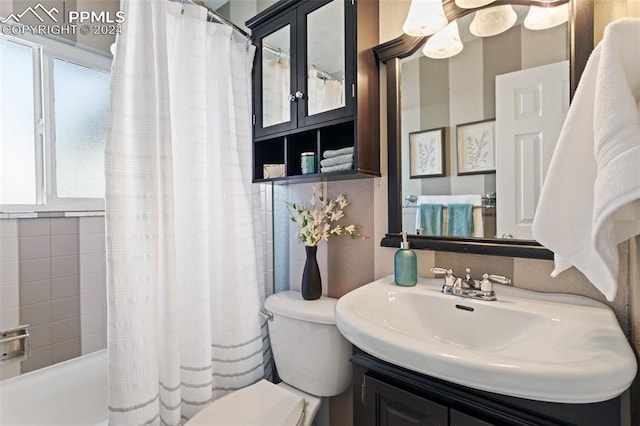 full bathroom with vanity, toilet, and shower / tub combo