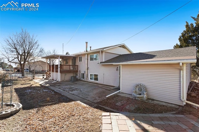 back of house featuring a patio area and central AC unit