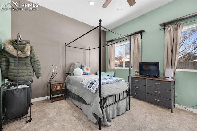 carpeted bedroom featuring ceiling fan