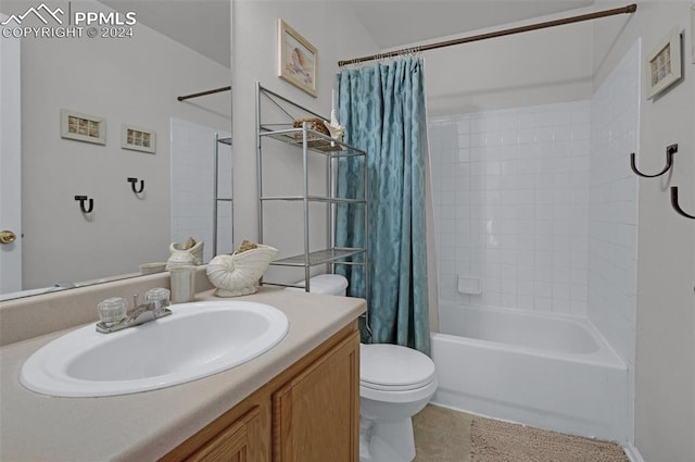 full bathroom with tile patterned floors, shower / bathtub combination with curtain, vanity, and toilet