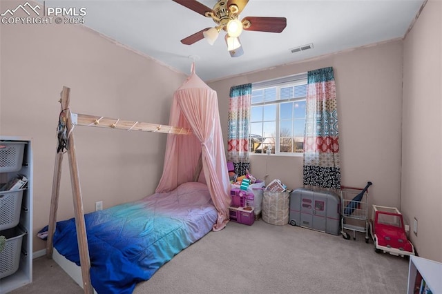 carpeted bedroom with ceiling fan