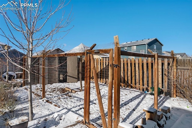 view of yard covered in snow