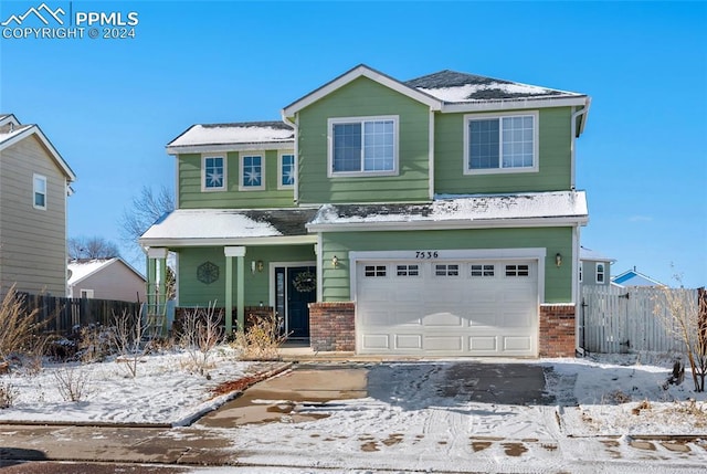 view of front of property featuring a garage