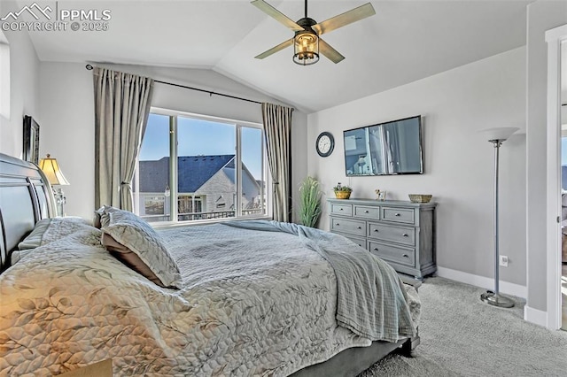 carpeted bedroom featuring vaulted ceiling and ceiling fan