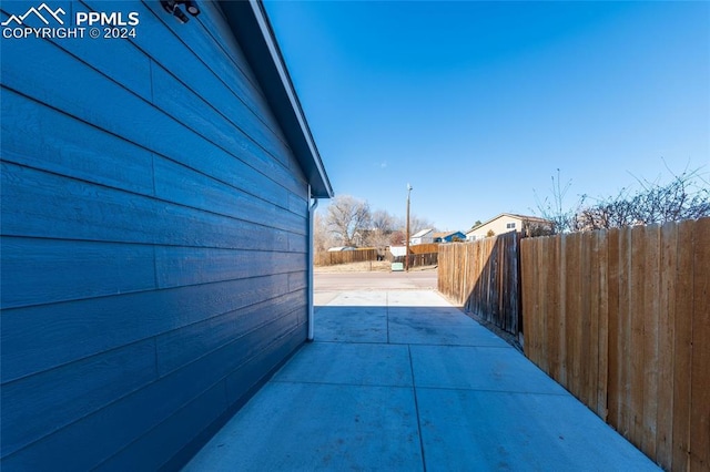 view of home's exterior with a patio