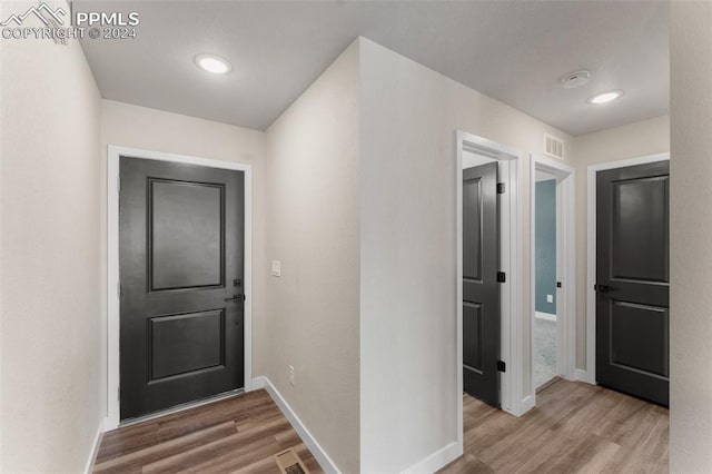 hall featuring light hardwood / wood-style flooring