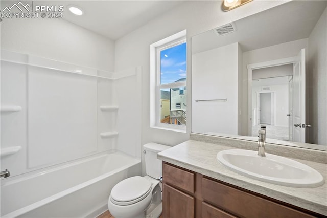 full bathroom with vanity, toilet, and bathing tub / shower combination