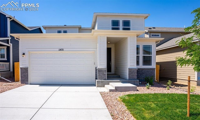 view of front of home with a garage