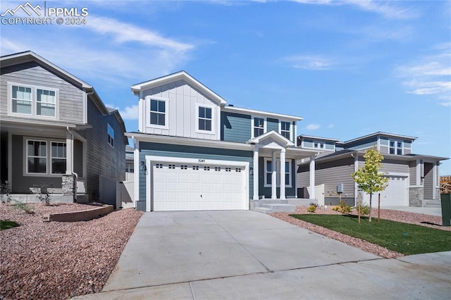 view of front of property with a garage