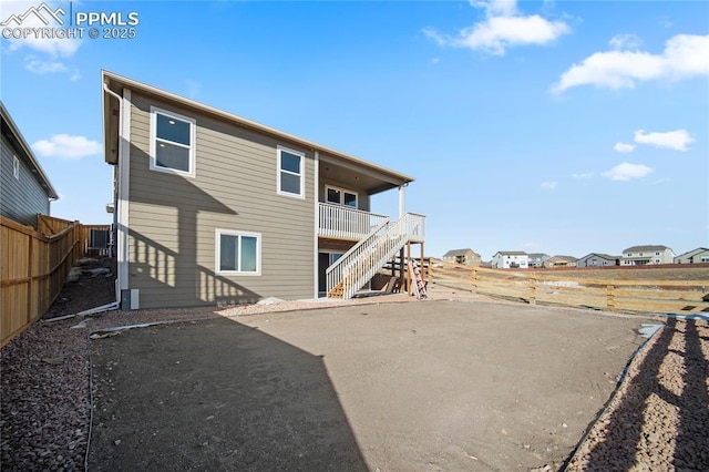 back of property with a patio area