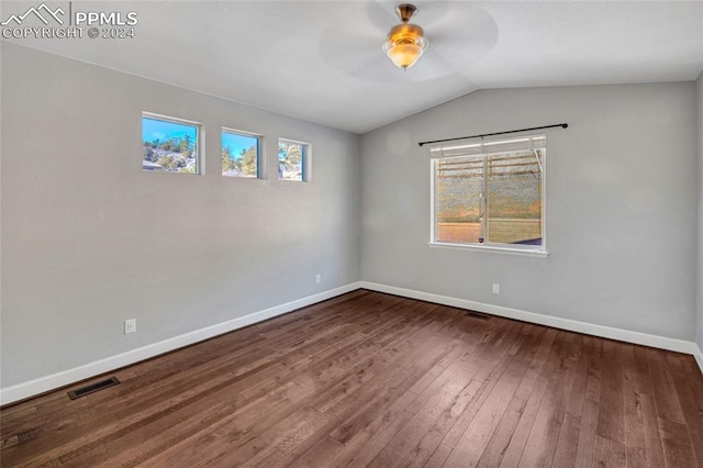 unfurnished room with wood-type flooring, vaulted ceiling, and ceiling fan