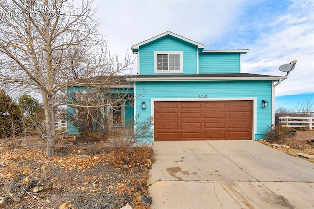 front of property featuring a garage