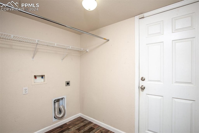 clothes washing area with electric dryer hookup, dark wood-type flooring, and washer hookup