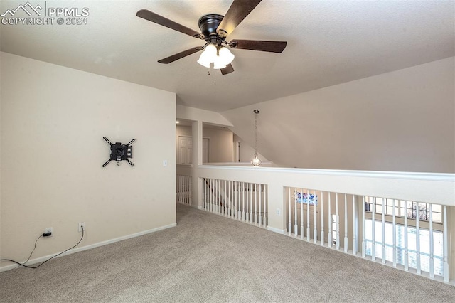 additional living space featuring carpet, ceiling fan, and lofted ceiling