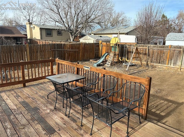 wooden deck with a playground